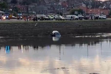 Car in the River Esk, Whitby.