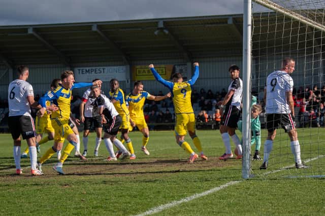 Boro skipper Will Thornton and teammates celebrate his last-gasp winner at play-off rivals Darlington on Good Friday. Photo by Wandering Photography