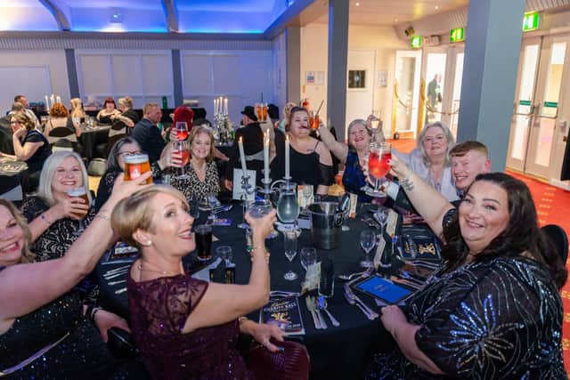 Raising a glass to a great evening.