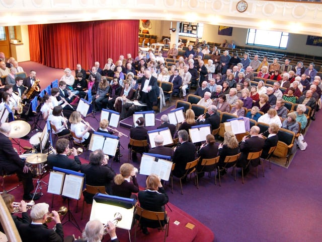 The audience enjoys the music from the Scarborough Concert Band.