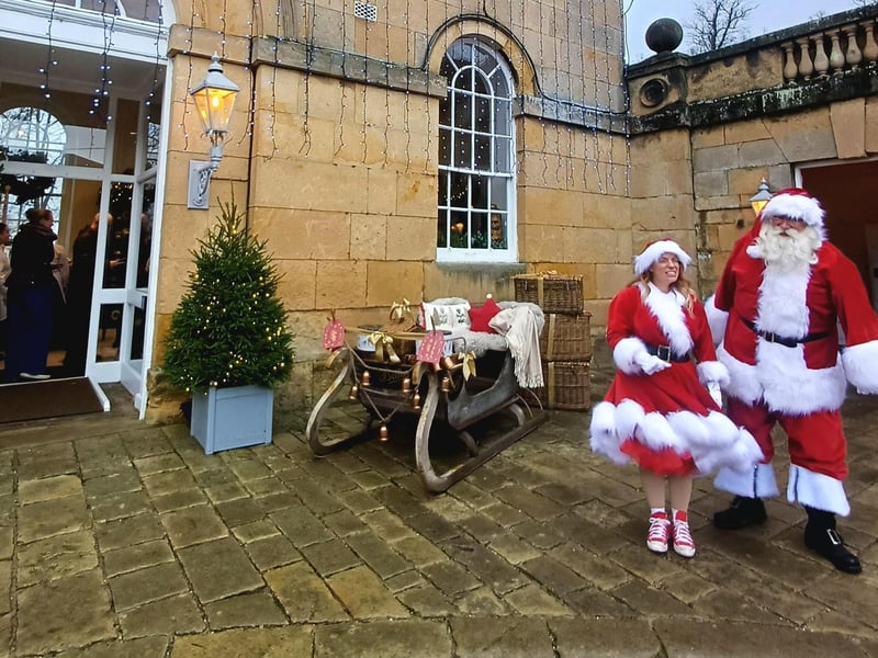 Santa and Mrs Santa with their sleigh. photo: Emma Atkins