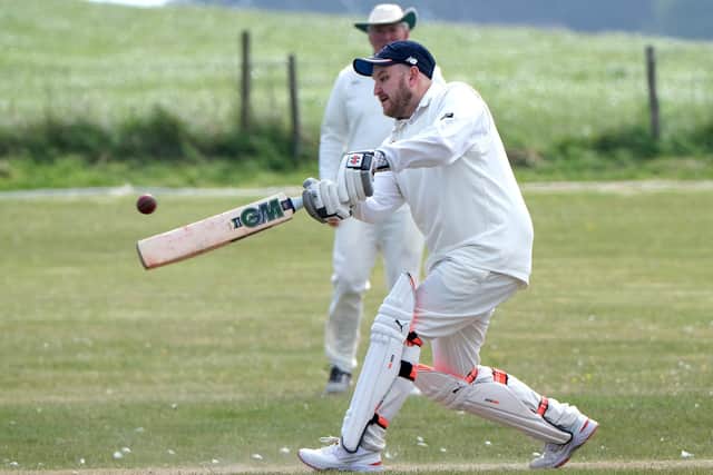 Sam Bull hits out for Ravenscar at home to Scalby. Photo by Richard Ponter