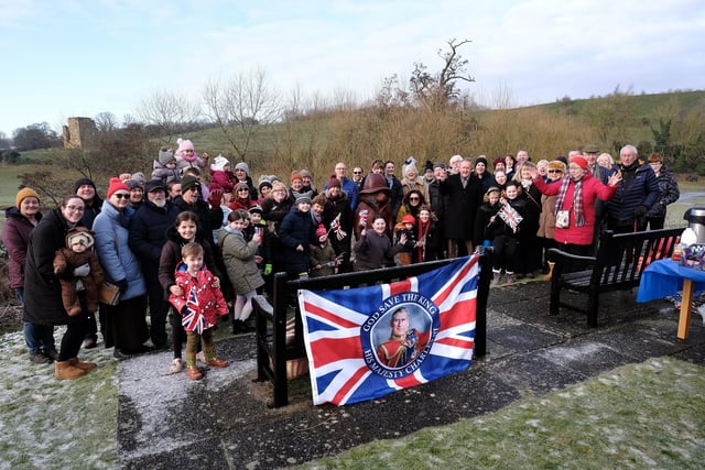 Villagers gathered to celebrate the unveiling