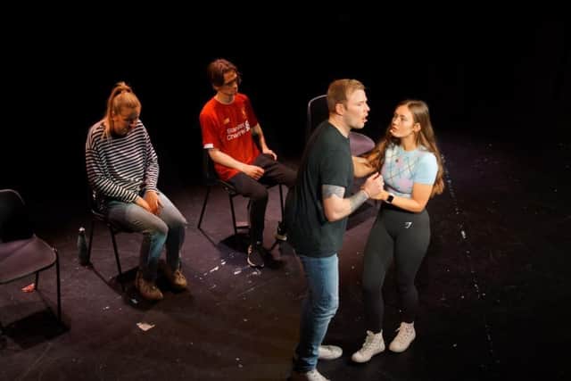 A performance of It's Not Love.