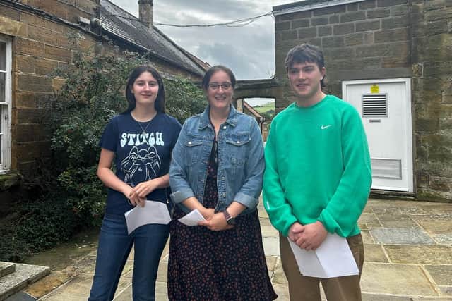 Hard work paid .... Fyling Hall School students Phoebe and Harry with Mrs Aldous.