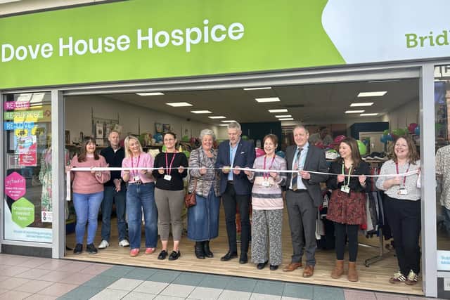 The official ribbon-cutting ceremony was conducted by Dove House trustees Jim Harris and Sally Booker.