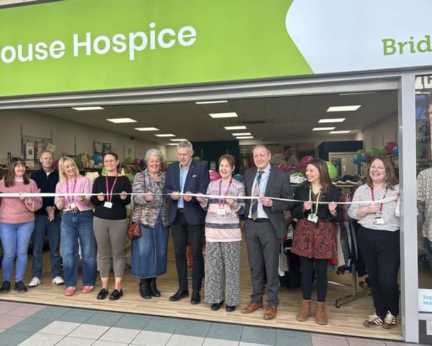 The official ribbon-cutting ceremony was conducted by Dove House trustees Jim Harris and Sally Booker.