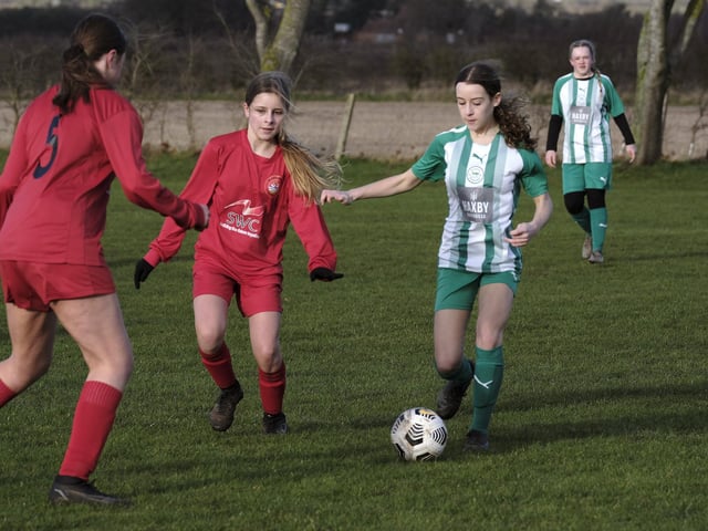 Scarborough Ladies Under-14s look to halt a Wigginton attack