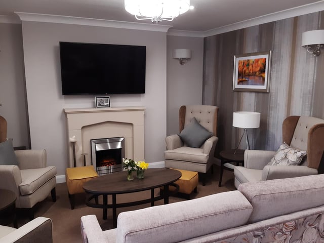 Seating area next to the residents' dining room at The Mayfield.
