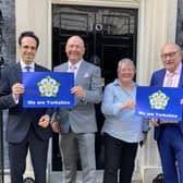 From left: Cllrs George Jabbour, Phil Trumper, Heather Phillips and Andy Paraskos holding We are Yorkshire posters outside 10 Downing Street.