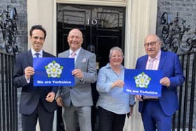 From left: Cllrs George Jabbour, Phil Trumper, Heather Phillips and Andy Paraskos holding We are Yorkshire posters outside 10 Downing Street.