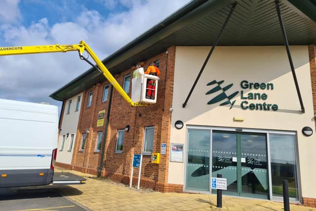 Six swift boxes and a solar powered bird call system installed high on the Green Lane Centre, Whitby.