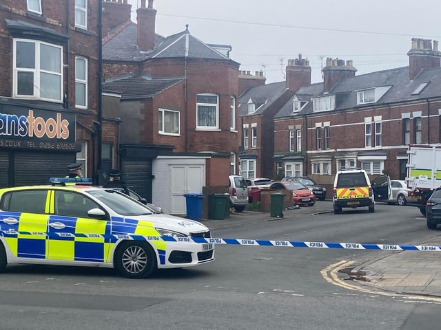Police cordon off surrounding streets.