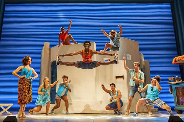 Jayden Oshenye as Pepper and the cast of MAMMA MIA!