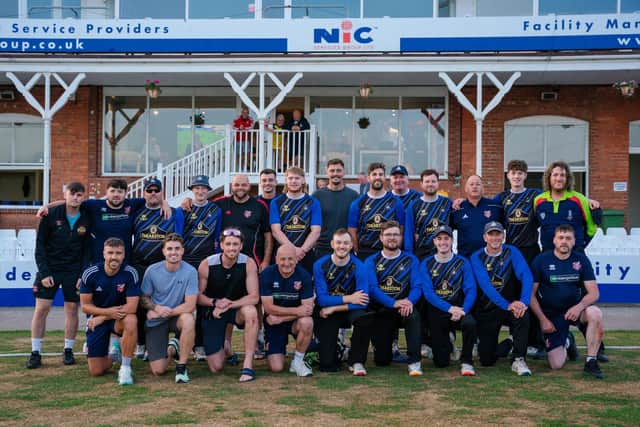 The two teams line up before the game at the North marine Road ground on Thursday evening. Photo by Wandering Photography