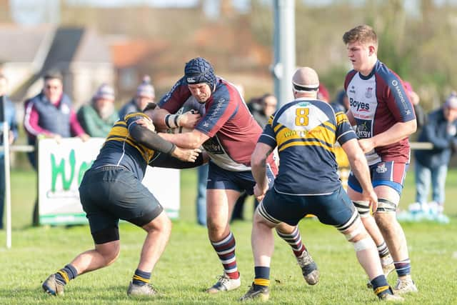 Stalwart Phil Watson tries to force his way during the win at Dukes Park.