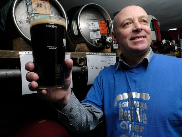 Organiser Mike Stock raises a pint. picture: Richard Ponter