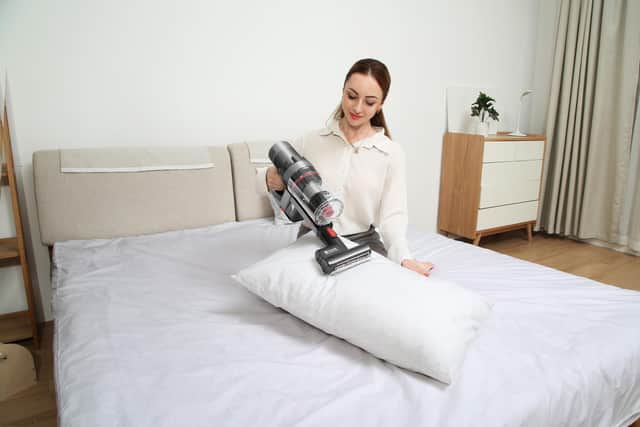 The P11 features a mini-motorised tool that can remove stubborn dust on beds, sofas and pillows. Image: Proscenic
