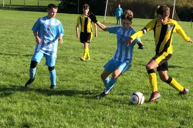 Scalby U15s' skippers on the attack against Eastfield.