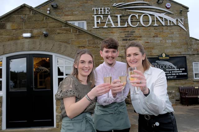 Georgia Reeves, Matthew Lockhart and Bryony Jackson celebrate the opening