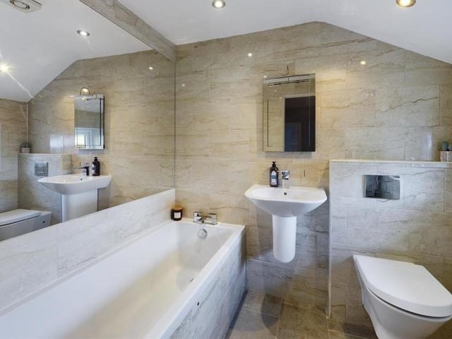 A stylish bathroom within the house.