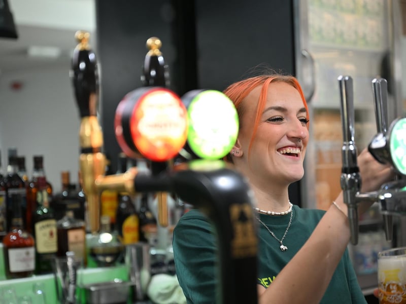 Ebony Cooper working at the bar