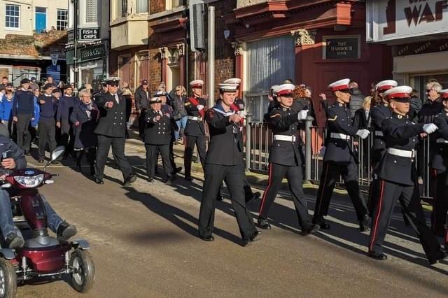 Proudly marching by
