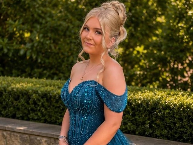 A stunning girl in a stunning dress.
