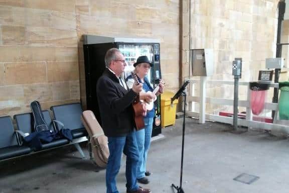 Music was played for the group while they waited for the return train.