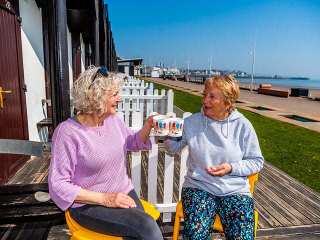 Pictured (left to right) Irene Bradbury, from Nafferton, with friend Julie Langley, from Skipsea, enjoying a cup of tea whilst sat at the beach huts.