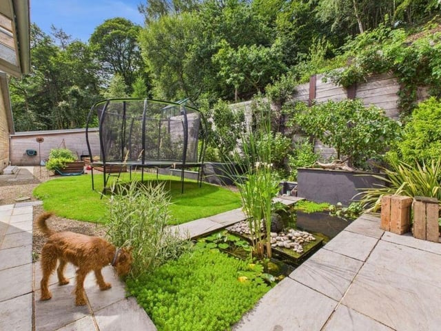 Lawned and enclosed garden space.
