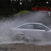 Cars drive the flooded road on Burniston Road, Scarborough, as Storm Ciara takes hold.
Picture by Simon Hulme