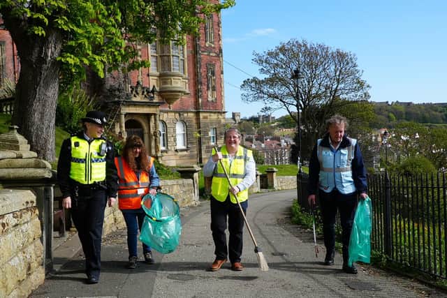 From left to right, North Yorkshire Police’s Chief Inspector Lucy McNeill, North Yorkshire Council’s elected member for Castle Division, Cllr Janet Jefferson, North Yorkshire Council’s executive member for corporate services, whose responsibilities include stronger communities and community safety, Cllr Heather Phillips, and the voluntary chair of Keep Scarborough Tidy, Mick Couzens take part in a clean-up in Scarborough.