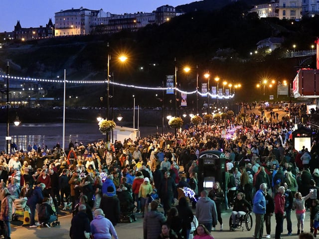 The crowds enjoy the parade.