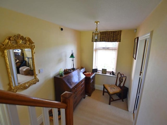The hallway and stairs of the property.