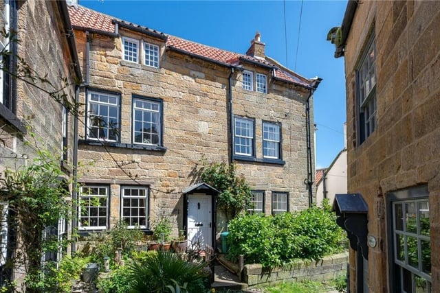 The attractive frontage of the four-bed house in Robin Hood's Bay.