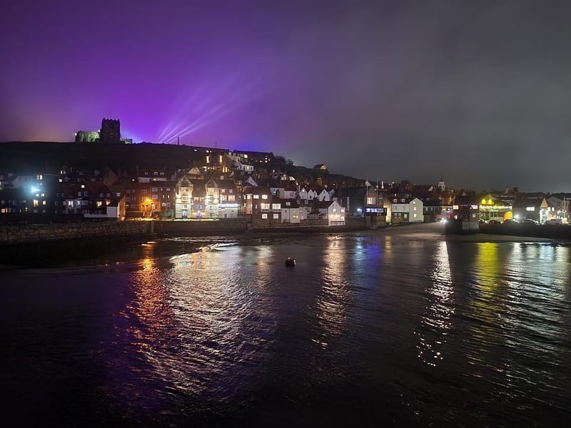 Lights from illuminated abbey shining over Whitby.
picture: Helen L Grief.