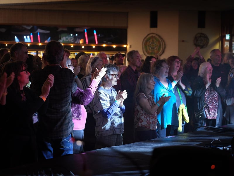 Crowds enjoy the music.