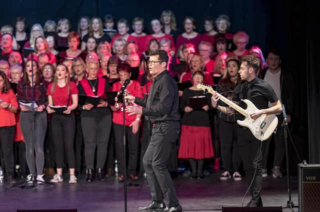 Musical director Mark Howley with the Remarkable Rock choir