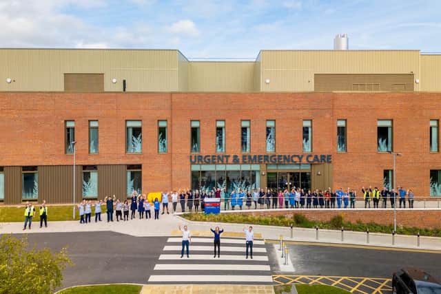 Trust teams celebrate the opening of the new UECC