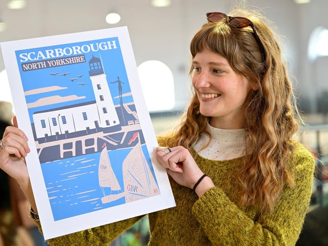 A local artist showing off her splendid work.