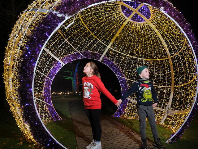 Isla and Felix enjoy the Wonderland Globe