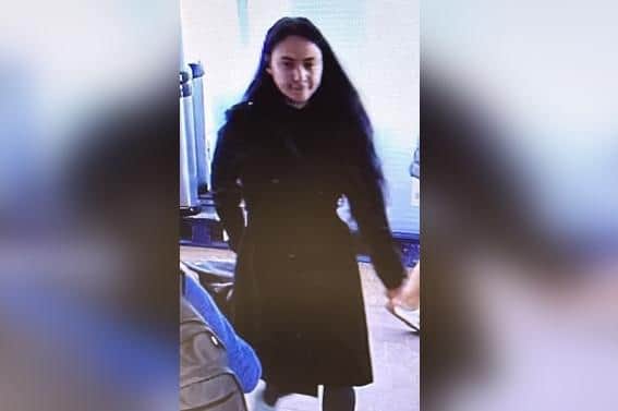 CCTV image of a woman police would like to speak to, following a shop theft in Filey.