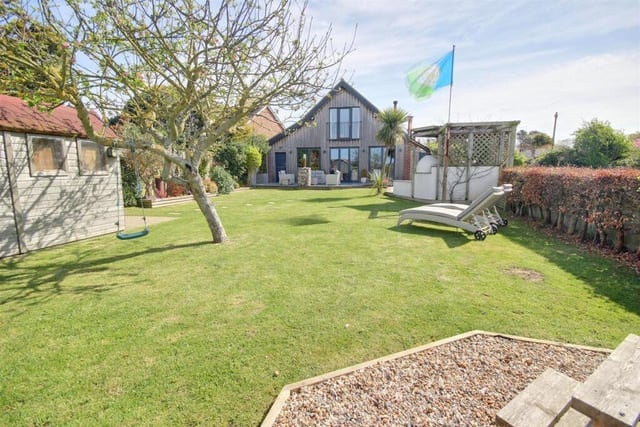 A rear view of the property from its extensive garden.