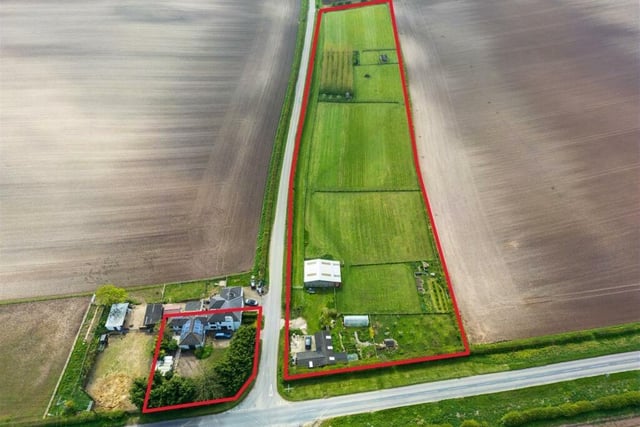 An aerial view of the property, with boundaries outlined.