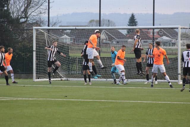Joe Gallagher heads in the late winner for Edgehill against Great Ayton