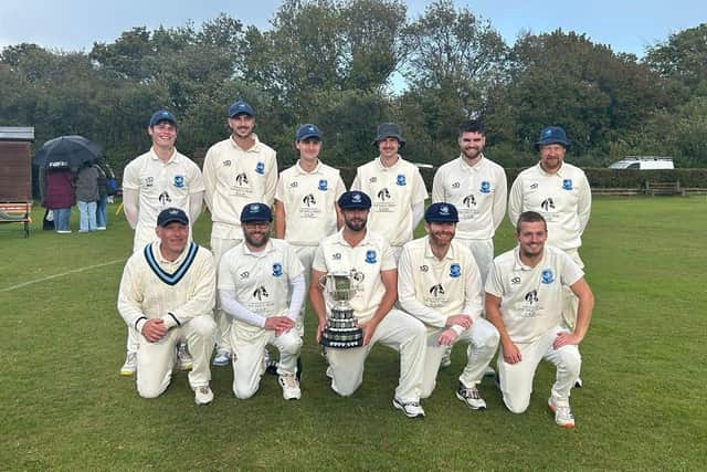 Scalby show off their Beckett League winner's trophy.