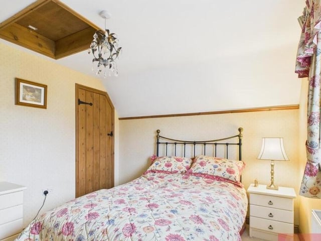 The cottage's second country-style bedroom.