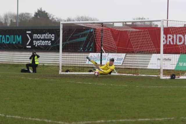 Alex Baird saves Chris McDonald's penalty. Photo by Rhys O'Callaghan