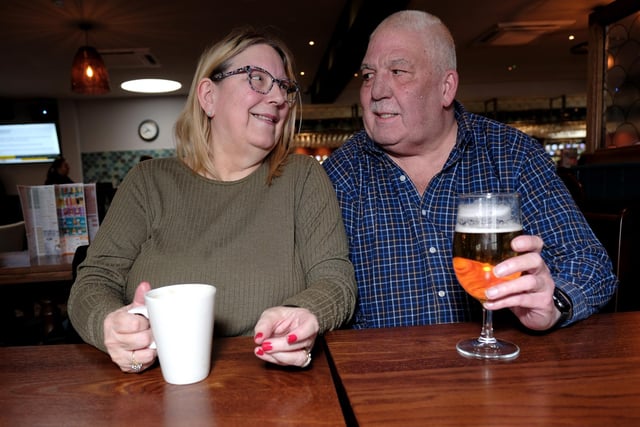 Malcolm and Hilary Peart enjoy a drink.